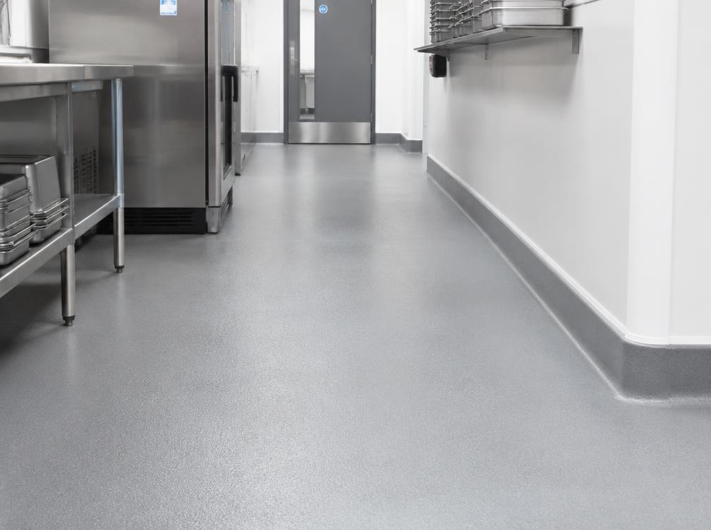 Slip-resistant safety flooring fitted in a commercial kitchen